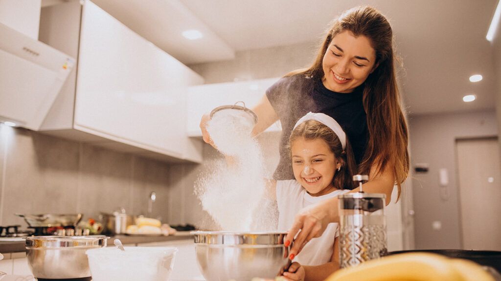 mother-with-daughter-baking-kitchen-together_edit